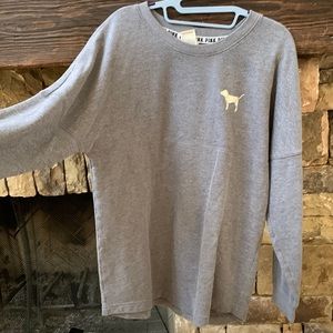 pink long sleeve/crewneck with gold on the back